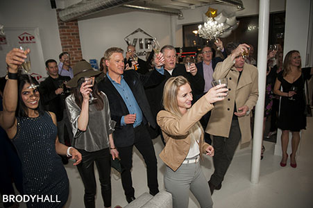 Guest raising glasses at a VIP Real Estate company party Guest raising glasses at a VIP Real Estate company party