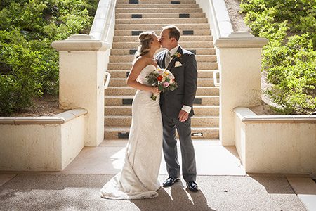 Bride & Groom kissing in front of stairs Bridal couple kissing in front of a stair case in Las Vegas, Nevada