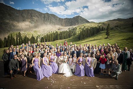 Bridal party and guest outside in the mountains Group photo of bridal party and guest outside in the mountains of Colorado