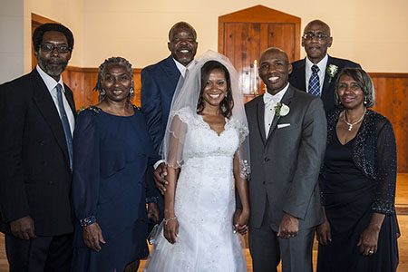Bridal family bridal couple posing with family in Nashville