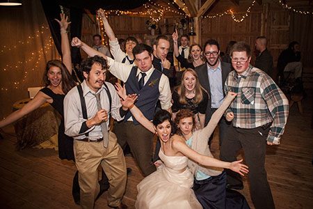 Bridal party having fun at the reception group shot of some wedding reception fun in Tennessee