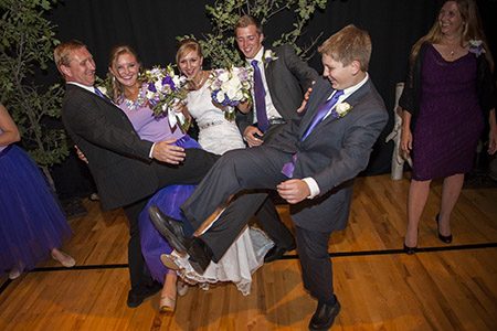 Reception fun Bridal party having fun at the reception in Colorado