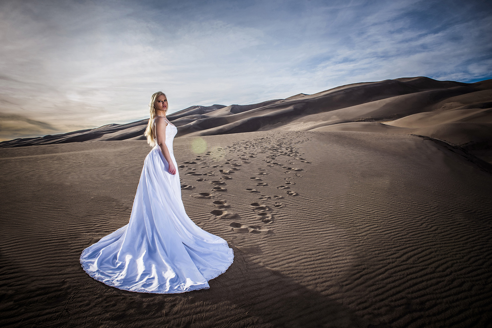 bride in wedding dress at Great Sand Dunes in Colorado