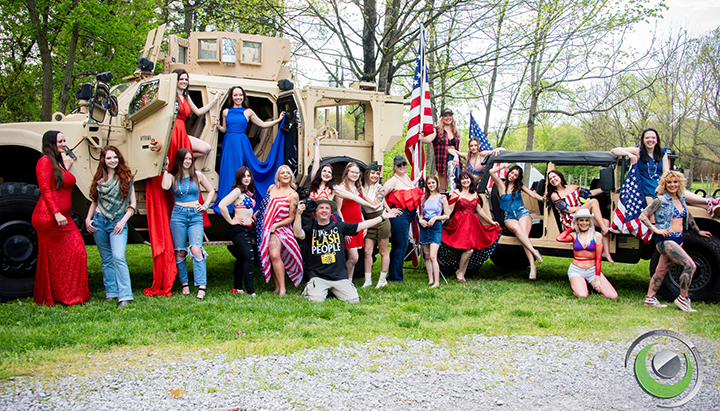 Photo by Shea Williams Brody, a US Army truck, a humvee, and 20 models dressed in patriotic colors. Taken at a group shoot at Sinking Creek Farm, Murfreesboro, TN.