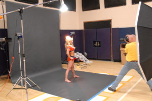 01-bts-cheerleading-shoot Behind the scenes image of a cheerleading squad shoot in Denver